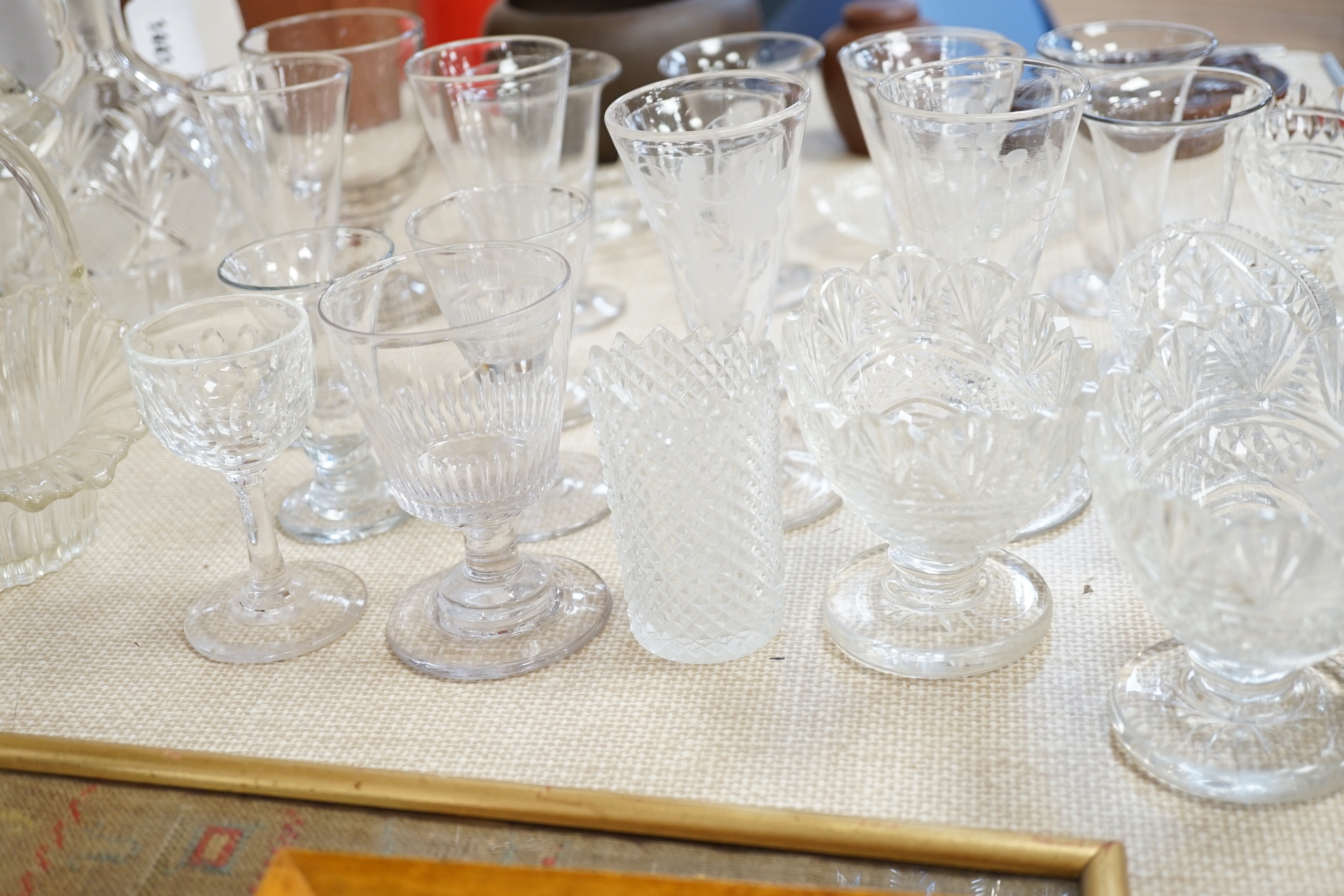 A quantity of cut and engraved glass including salts, decanters, cocktail shaker, rummers etc (30)
